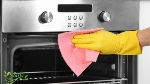Baking soda vinegar oven cleaner ingredients on kitchen counter