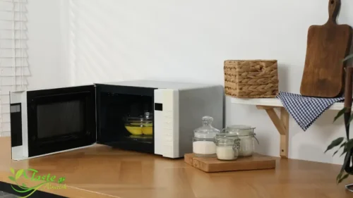 Step-by-step process to clean microwave with lemon halves and water