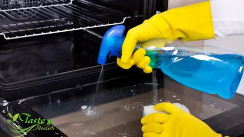 "Disassembled oven door showing double-pane glass separation for cleaning between glass with oven glass cleaner"